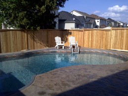 Choosing The Right Pool Enclosure: Wood Fences