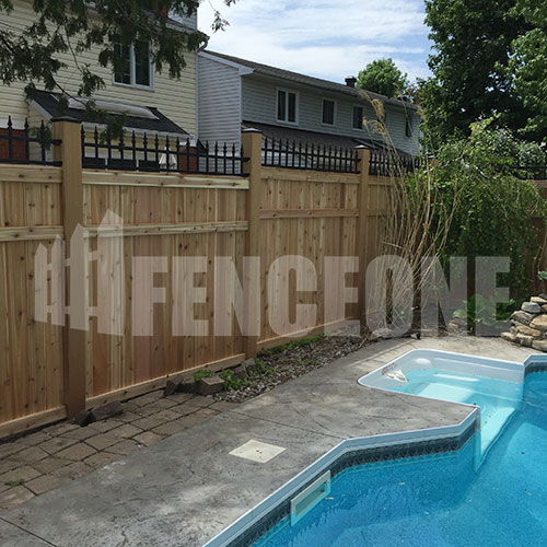 wooden fence surrounding pool