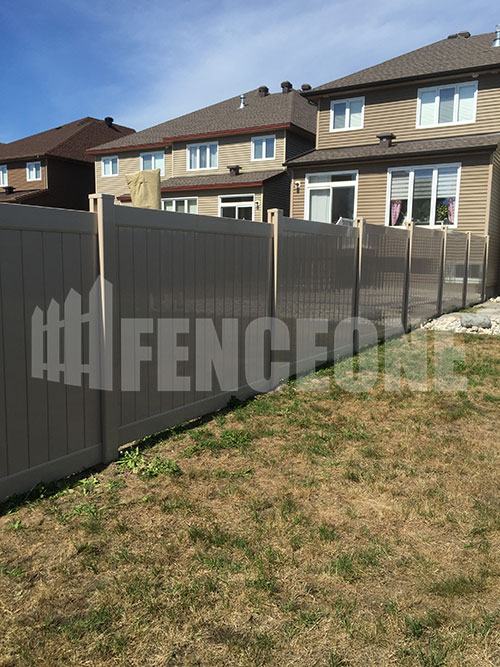 vinyl fence surrounding backyard